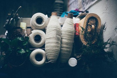 Close-up of white spools at home