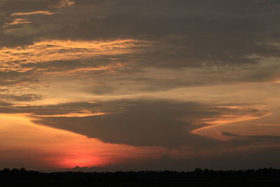 Scenic view of dramatic sky during sunset