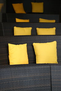 High angle view of yellow paper on bed