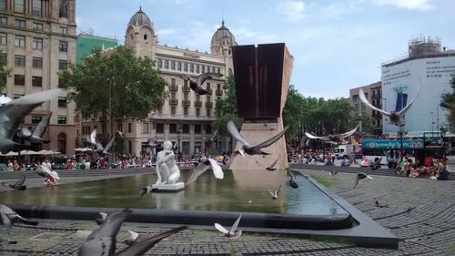 Fountain in front of buildings