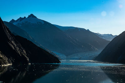 Scenic view of mountains against sky - dawes glacier in endicott arm fjord