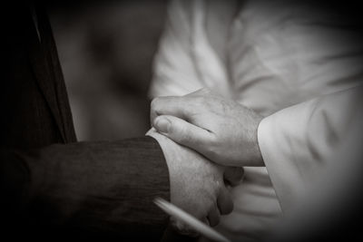 Cropped hand of woman with hands