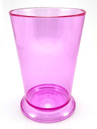 Close-up of empty glass against white background