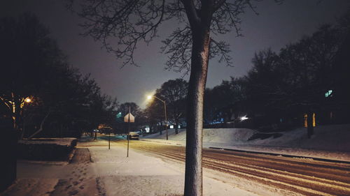 View of street at night during winter
