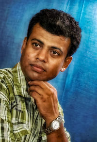 Portrait of young man looking away