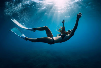 Man swimming in sea