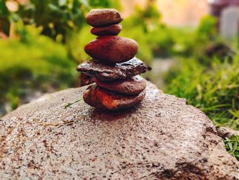 Close-up of stone stack on rock