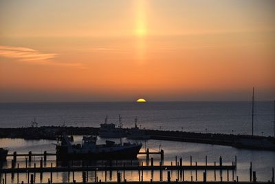 Scenic view of sea at sunset