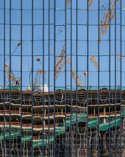 Metallic structure against blue sky