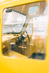 Close-up of yellow car window