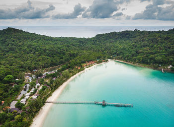 High angle view of swimming pool by sea against sky