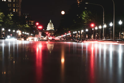 Illuminated buildings in city at night