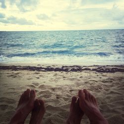 Low section of people on beach