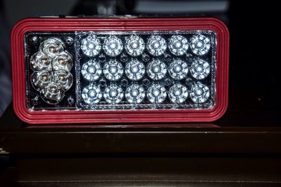 Close-up of led flashlight on table