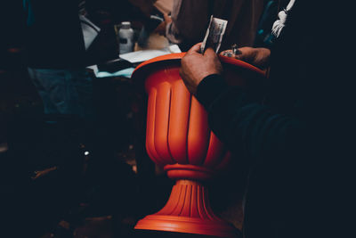 Close-up of hands on table
