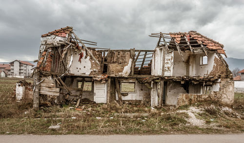 View of old abandoned building against sky