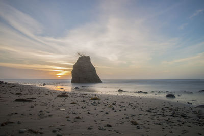 Scenic view of beach during sunset