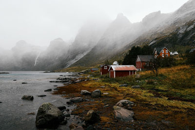 Scenic view of abandoned village vindstad at the sea in lofoten norway and mountains 