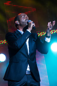 Singer performing in concert