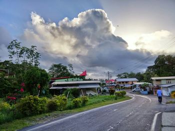 View of road against cloudy sky
