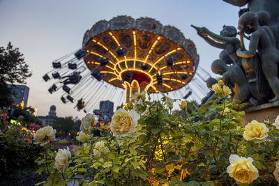 Low angle view of ferris wheel against sky