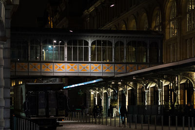 Street photography at night in saint lazare station in paris