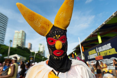 People in costumes are seen parading and having fun during fuzue, pre-carnival