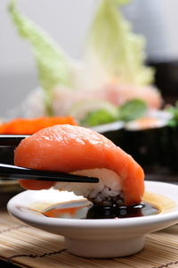 Close-up of sushi served on table