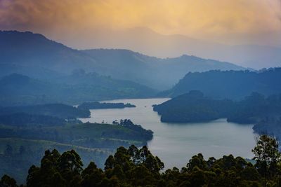 Scenic view of mountains against sky during sunset