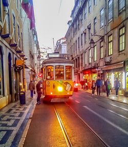 Vehicles on illuminated city street