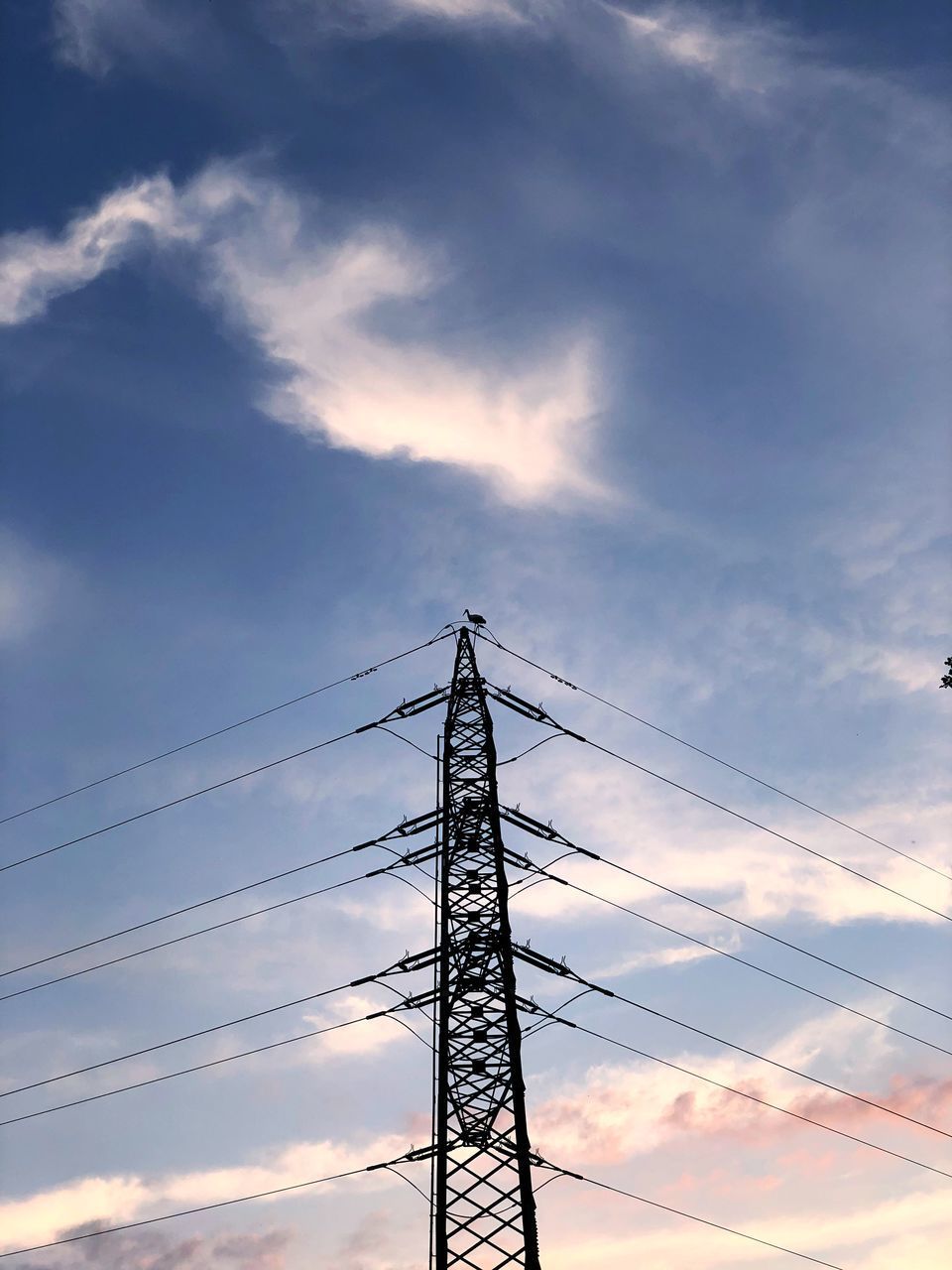 LOW ANGLE VIEW OF SILHOUETTE ELECTRICITY PYLONS AGAINST SKY DURING SUNSET