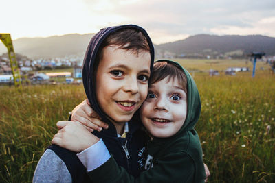 Two happy brothers are hugging and smiling. childhood. children. high quality photo
