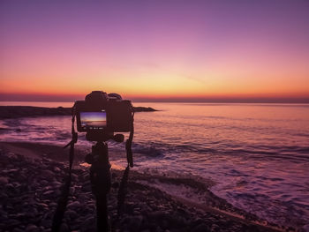 Scenic view of sea against sky during sunset