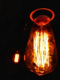 Close-up of illuminated light bulb