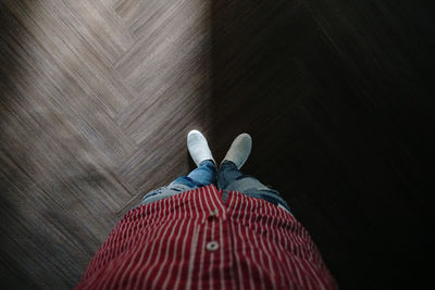 Low section of person standing on floor