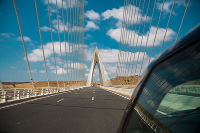 View of suspension bridge against sky