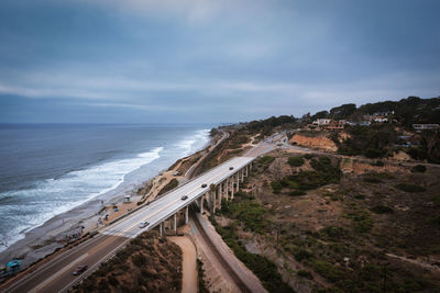 Aerial view of highway near torrey pines state beach, del mar, san diego california. drone shot.