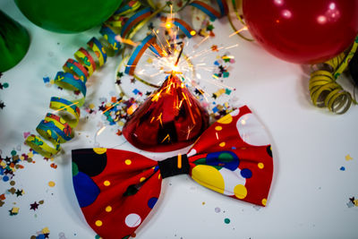 Close-up of multi colored balloons on table