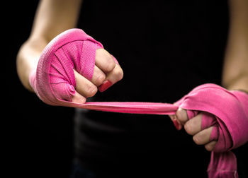 Midsection of woman wearing bandage