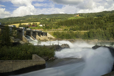 Scenic view of dam against sky