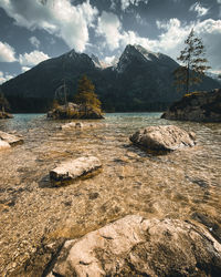 Scenic view of rocks in mountains against sky