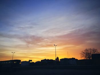 Silhouette of building at sunset