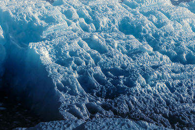 High angle view of glaciers in sea during winter