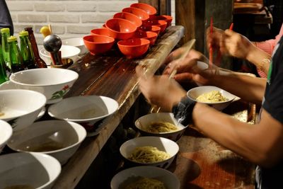 People having food in kitchen