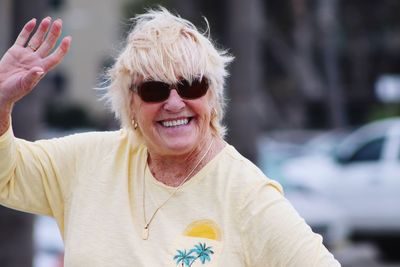 Smiling senior woman wearing sunglasses