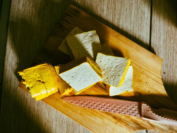 High angle view of chunk tofu on kitchen table