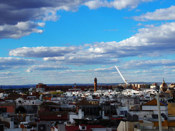 Cityscape against blue sky