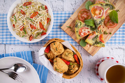 High angle view of food served on table