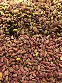 Full frame shot of pistachios for sale at market stall