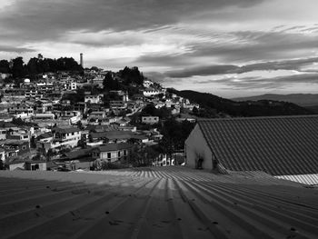 Town against cloudy sky